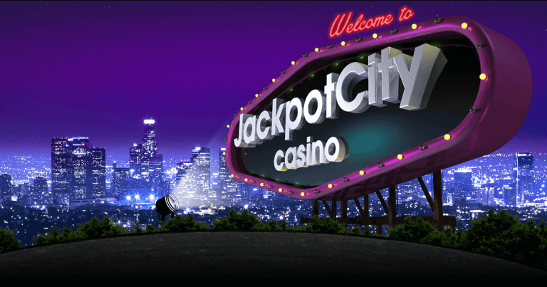 Welcome to Jackpot City Casino sign at night in a.